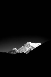 peak in snow in black and white
