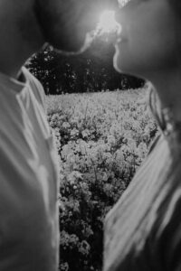 black and white photo of a couple standing face to face